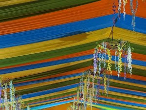 Striped multicolour canopy and hanging decorations, Agrani Socio Cultural Association