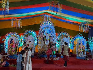 Wide view of Durga idol tableau and visitors, Agrani Socio Cultural Association