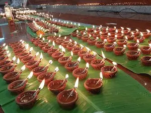 Rows of ritual pots and offerings, Assam Association Durga Puja